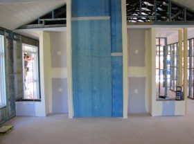 Fireplace wall getting prepped for stone cladding